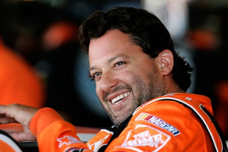 WATKINS GLEN, NY - AUGUST 11: Tony Stewart, driver of the #20 Home Depot Chevrolet, climbs into his car prior to practice for the NASCAR Nextel Cup Series Centurion Boats at The Glen at Watkins Glen International on August 11, 2007 in Watkins Glen, New York. (Photo by Jason Smith/Getty Images for NASCAR) | Getty Images