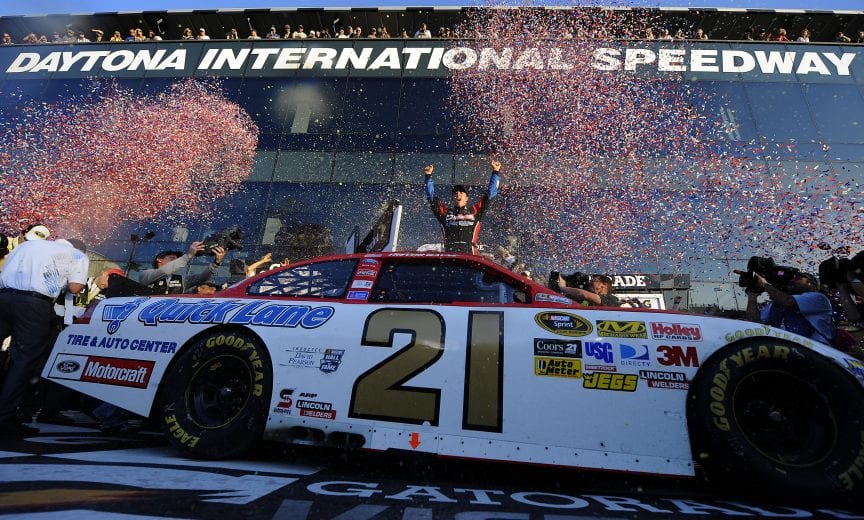 DAYTONA BEACH, FL - FEBRUARY 20: Trevor Bayne, driver of the #21 Motorcraft/Quick Lane Ford, celebrates in Victory Lane after winning the NASCAR Sprint Cup Series Daytona 500 at Daytona International Speedway on February 20, 2011 in Daytona Beach, Florida. (Photo by Jared C. Tilton/Getty Images for NASCAR) | Getty Images