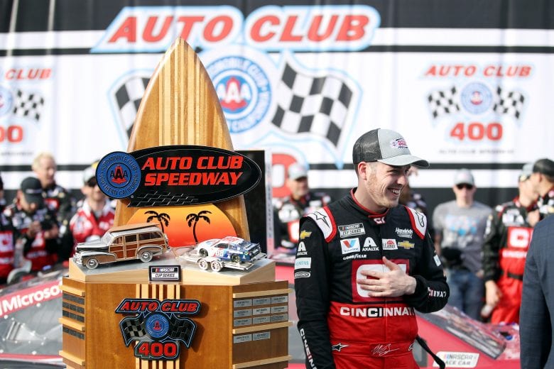 FONTANA, CALIFORNIA - MARCH 01: Alex Bowman, driver of the #88 Cincinnati Chevrolet, celebrates with the trophy in Victory Lane after winning the NASCAR Cup Series Auto Club 400 at Auto Club Speedway on March 01, 2020 in Fontana, California. (Photo by Katelyn Mulcahy/Getty Images) | Getty Images
