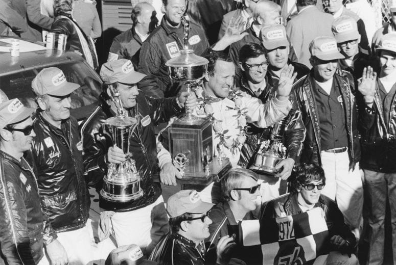 DAYTONA BEACH, FL - FEBRUARY 20, 1972: A.J. Foyt enjoys his 1972 Daytona 500 win with crew and car owners, the Wood Brothers. (Photo by ISC Archives/CQ-Roll Call Group via Getty Images)