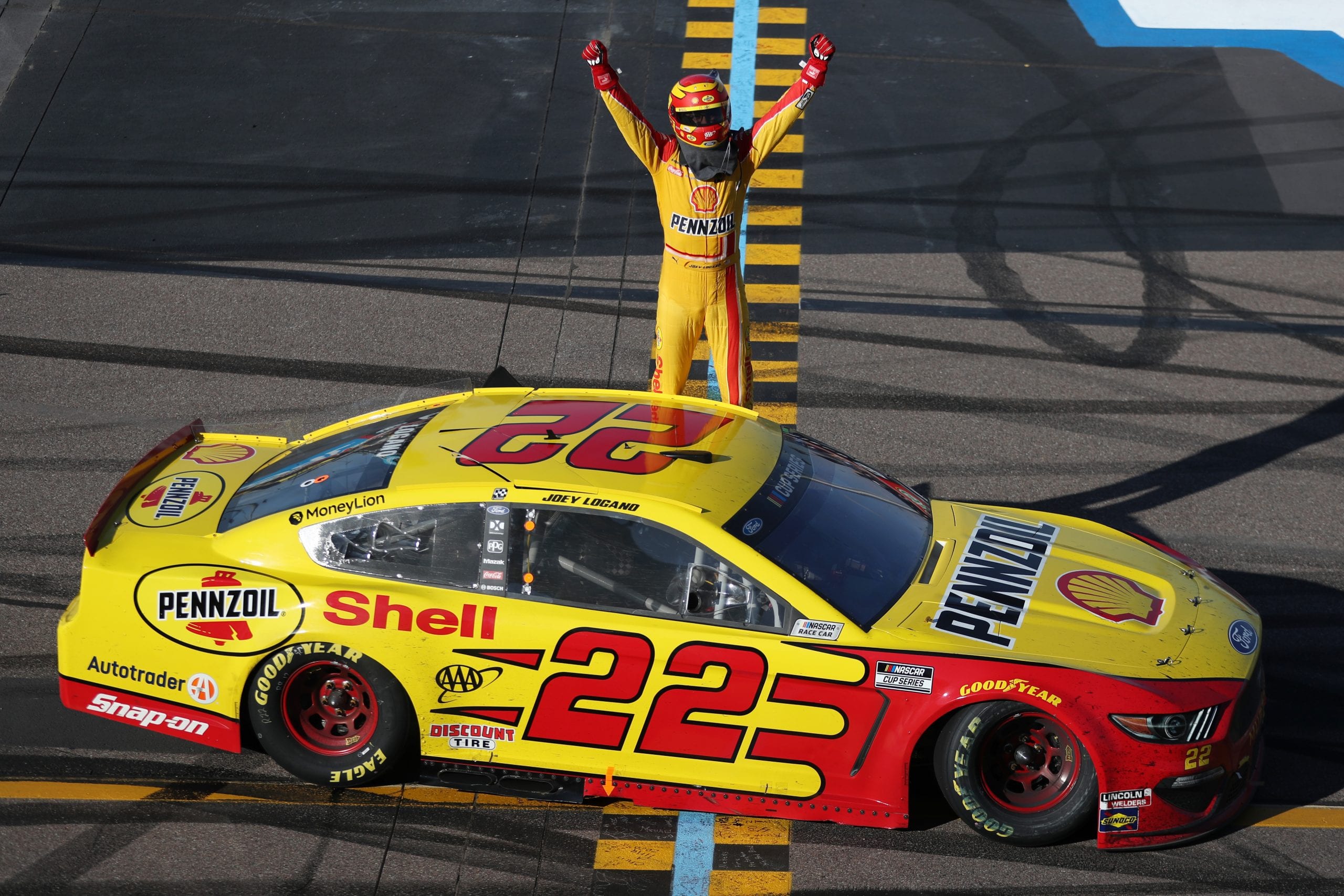 AVONDALE, ARIZONA - MARCH 08: Joey Logano, driver of the #22 Shell Pennzoil Ford, celebrates after winning the NASCAR Cup Series FanShield 500 at Phoenix Raceway on March 08, 2020 in Avondale, Arizona. (Photo by Chris Graythen/Getty Images) | Getty Images