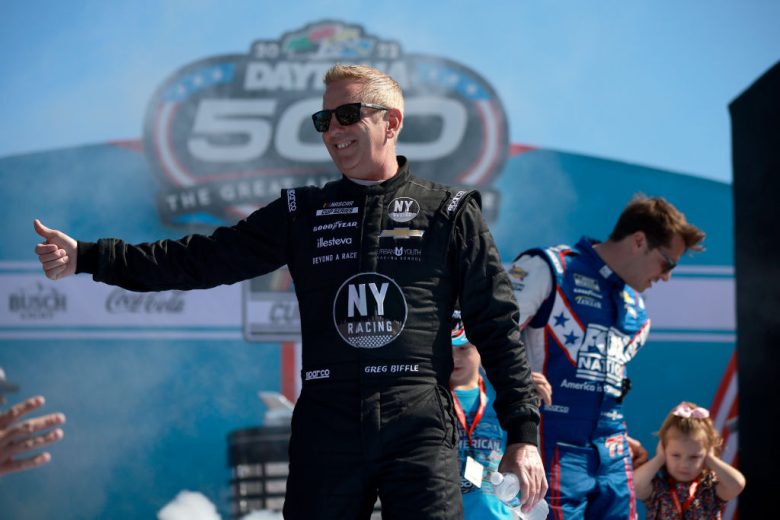 DAYTONA BEACH, FLORIDA - FEBRUARY 20: Greg Biffle, driver of the #44 Grambling State University Chevrolet, waves to fans onstage during driver intros prior to the NASCAR Cup Series 64th Annual Daytona 500 at Daytona International Speedway on February 20, 2022 in Daytona Beach, Florida. (Photo by Jared C. Tilton/Getty Images) | Getty Images