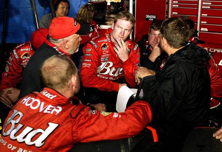 RICHMOND, VIRGINA - MAY 4: Dale Earnhardt Jr. talks to his crew during a rain delay during the NASCAR Winston Cup Series Pontiac Excitement 400 at Richmond Internatinal Raceway in Richmond, Virginia on May 4, 2002. (Photo by: Jonathan Ferrey/Getty Images)
