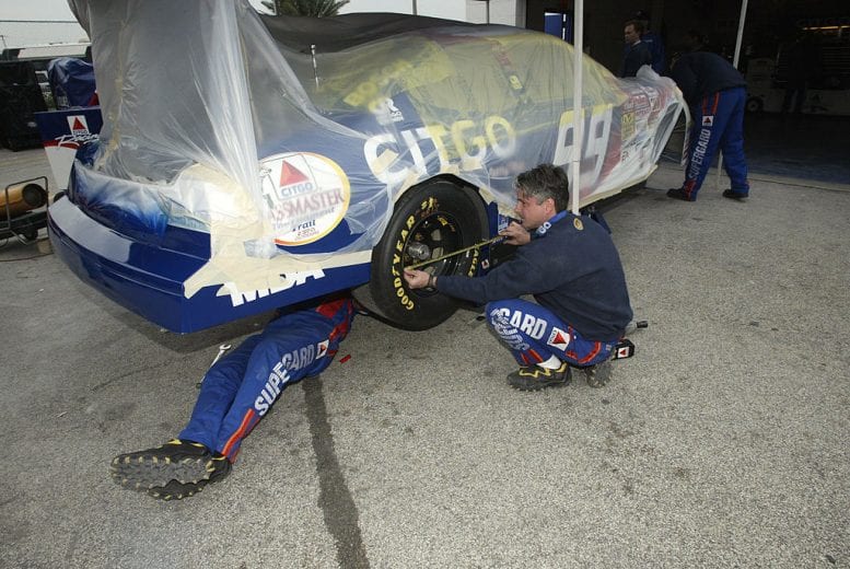 13 FEB 2002: Team members work on the #99 CITGO Ford of Jeff Burton during Daytona 500 speedweeks in preparation for the NASCAR Winston Cup Daytona 500 at Daytona International Speedway in Daytona, Florida. DIGITAL IMAGE - Mandatory Credit: Jonathan Ferrey/Getty Images