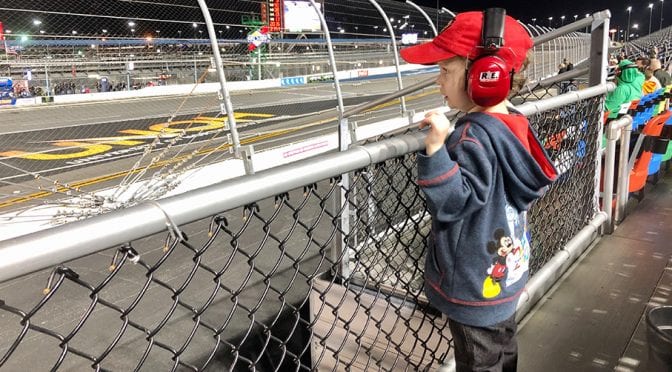 Harbin promoting autism awareness with ribbon on eNASCAR Heat Pro League car