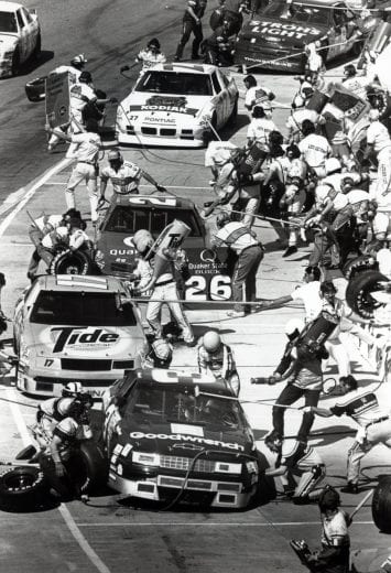 NORTH WILKESBORO, NC - OCTOBER 15: Dale Earnhardt, Darrell Waltrip, Ricky Rudd, Rusty Wallace and Mark Martin all pull into the pits at the Holly Farms 400.(Photo by Racing Photo Archives/Getty Images)