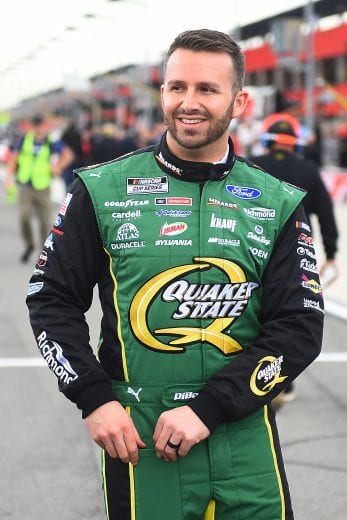 FONTANA, CALIFORNIA - FEBRUARY 29:   Matt DiBenedetto, driver of the #21 Menards/Quaker State Ford, walks to his car during qualifying for the NASCAR Cup Series Auto Club 400 at Auto Club Speedway on February 29, 2020 in Fontana, California. (Photo by Stacy Revere/Getty Images) | Getty Images