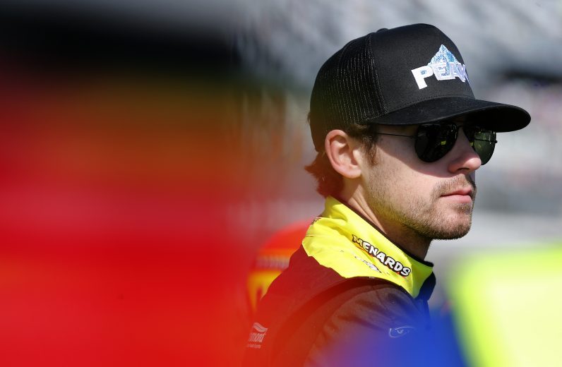 DAYTONA BEACH, FLORIDA - FEBRUARY 09: Ryan Blaney, driver of the #12 Menards/Peak Ford, stands on the grid during qualifying for the NASCAR Cup Series 62nd Annual Daytona 500 at Daytona International Speedway on February 09, 2020 in Daytona Beach, Florida. (Photo by Brian Lawdermilk/Getty Images) | Getty Images