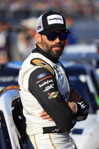 DAYTONA BEACH, FLORIDA - FEBRUARY 17: Aric Almirola, driver of the #10 Smithfield Ford, stands on the grid  during the NASCAR Cup Series 62nd Annual Daytona 500 at Daytona International Speedway on February 17, 2020 in Daytona Beach, Florida. (Photo by Chris Graythen/Getty Images) | Getty Images