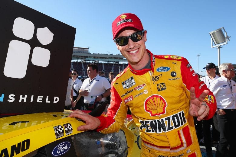 AVONDALE, ARIZONA - MARCH 08: Joey Logano, driver of the #22 Shell Pennzoil Ford, affixes the winners decal after winning the NASCAR Cup Series FanShield 500 at Phoenix Raceway on March 08, 2020 in Avondale, Arizona. (Photo by Christian Petersen/Getty Images) | Getty Images