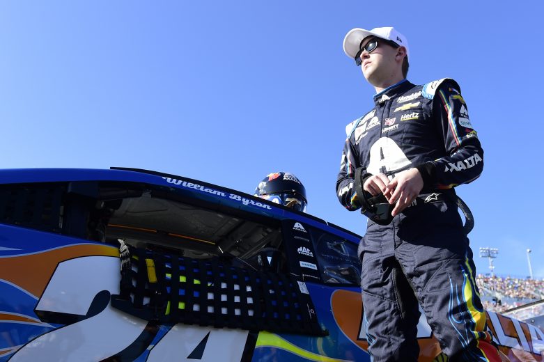 DAYTONA BEACH, FLORIDA - FEBRUARY 17: William Byron, driver of the #24 Axalta 'Color of the Year' Chevrolet, stands on the grid during the NASCAR Cup Series 62nd Annual Daytona 500 at Daytona International Speedway on February 17, 2020 in Daytona Beach, Florida. (Photo by Jared C. Tilton/Getty Images) | Getty Images