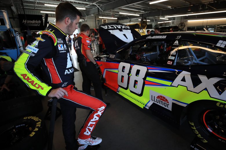 AVONDALE, ARIZONA - MARCH 06: Alex Bowman, driver of the #88 Axalta Chevrolet, stands in the garage area during practice for the NASCAR Cup Series FanShield 500 at Phoenix Raceway on March 06, 2020 in Avondale, Arizona. (Photo by Chris Graythen/Getty Images) | Getty Images
