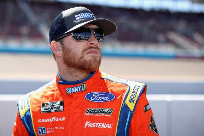 AVONDALE, ARIZONA - MARCH 07: Chris Buescher, driver of the #17 SunnyD Ford, stands on the grid during qualifying for the NASCAR Cup Series FanShield 500 at Phoenix Raceway on March 07, 2020 in Avondale, Arizona. (Photo by Christian Petersen/Getty Images) | Getty Images