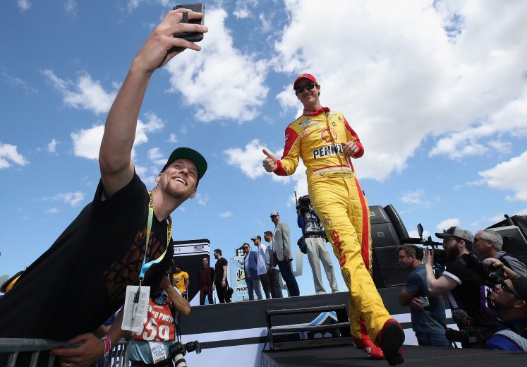 AVONDALE, ARIZONA - MARCH 08: Joey Logano, driver of the #22 Shell Pennzoil Ford, poses in a fan selfie during introductions to the NASCAR Cup Series FanShield 500 at Phoenix Raceway on March 08, 2020 in Avondale, Arizona. (Photo by Christian Petersen/Getty Images) | Getty Images
