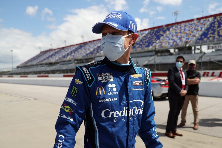 DARLINGTON, SOUTH CAROLINA - MAY 17: Matt Kenseth, driver of the #42 Credit One Bank Chevrolet, walks on to pit road prior to the NASCAR Cup Series The Real Heroes 400 at Darlington Raceway on May 17, 2020 in Darlington, South Carolina. NASCAR resumes the season after the nationwide lockdown due to the ongoing coronavirus (COVID-19).  (Photo by Chris Graythen/Getty Images) | Getty Images
