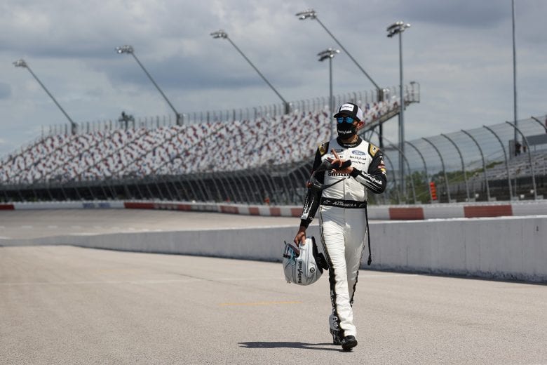 DARLINGTON, SOUTH CAROLINA - MAY 17:  Aric Almirola, driver of the #10 Smithfield Ford, walks pit road prior to the NASCAR Cup Series The Real Heroes 400 at Darlington Raceway on May 17, 2020 in Darlington, South Carolina. NASCAR resumes the season after the nationwide lockdown due to the ongoing coronavirus (COVID-19).  (Photo by Chris Graythen/Getty Images) | Getty Images
