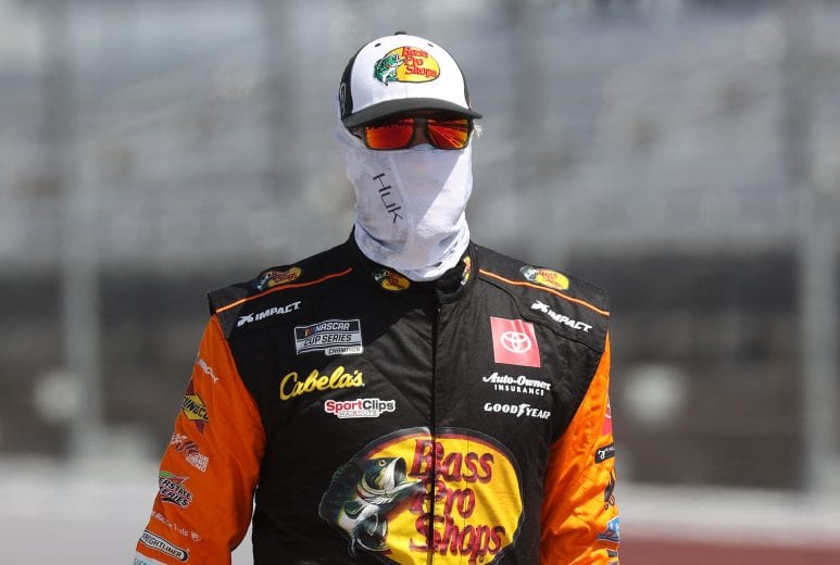 DARLINGTON, SOUTH CAROLINA - MAY 17:  Martin Truex Jr., driver of the #19 Bass Pro Shops Toyota, walks pit road prior to the NASCAR Cup Series The Real Heroes 400 at Darlington Raceway on May 17, 2020 in Darlington, South Carolina. NASCAR resumes the season after the nationwide lockdown due to the ongoing coronavirus (COVID-19).  (Photo by Chris Graythen/Getty Images) | Getty Images