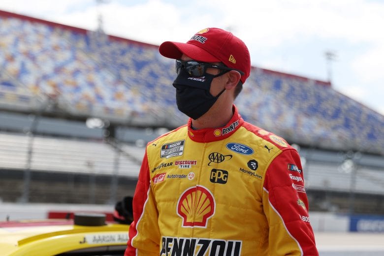 DARLINGTON, SOUTH CAROLINA - MAY 17:  Joey Logano, driver of the #22 Shell Pennzoil Ford, walks pit road prior to the NASCAR Cup Series The Real Heroes 400 at Darlington Raceway on May 17, 2020 in Darlington, South Carolina. NASCAR resumes the season after the nationwide lockdown due to the ongoing coronavirus (COVID-19).  (Photo by Chris Graythen/Getty Images) | Getty Images