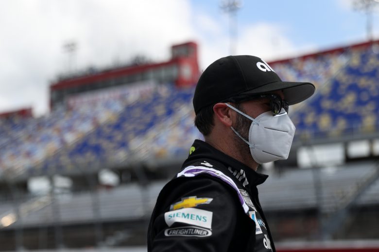 DARLINGTON, SOUTH CAROLINA - MAY 17:  Jimmie Johnson, driver of the #48 Ally Chevrolet, stands on the grid during the NASCAR Cup Series The Real Heroes 400 at Darlington Raceway on May 17, 2020 in Darlington, South Carolina. (Photo by Chris Graythen/Getty Images) | Getty Images