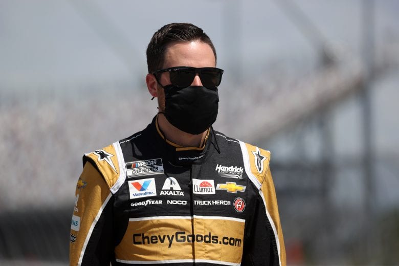 DARLINGTON, SOUTH CAROLINA - MAY 17:  Alex Bowman, driver of the #88 ChevyGoods.com NOCO Chevrolet, stands on the grid 
 during the NASCAR Cup Series The Real Heroes 400 at Darlington Raceway on May 17, 2020 in Darlington, South Carolina. (Photo by Chris Graythen/Getty Images) | Getty Images