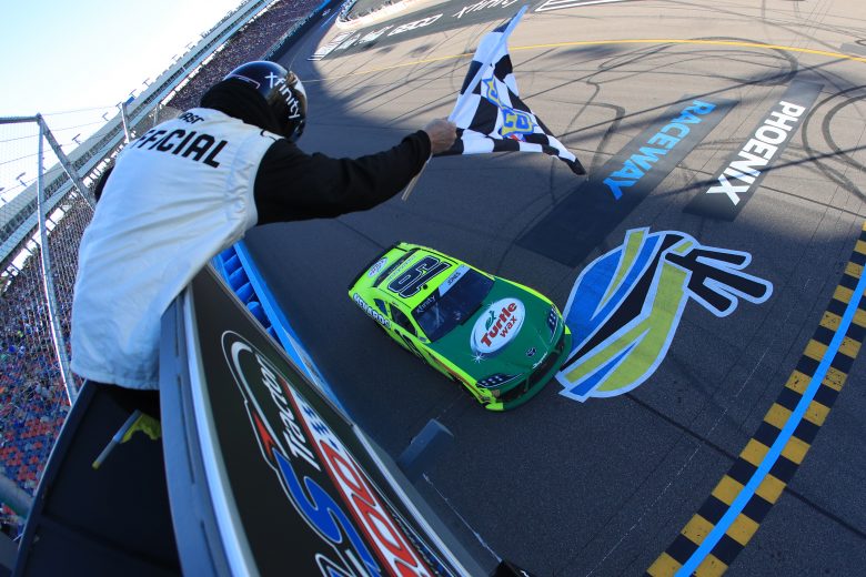 AVONDALE, ARIZONA - MARCH 07: Brandon Jones, driver of the #19 Menards/Turtle Wax Toyota, crosses the finish line to win the NASCAR Xfinity Series LS Tractor 200 at Phoenix Raceway on March 07, 2020 in Avondale, Arizona. (Photo by Chris Graythen/Getty Images) | Getty Images