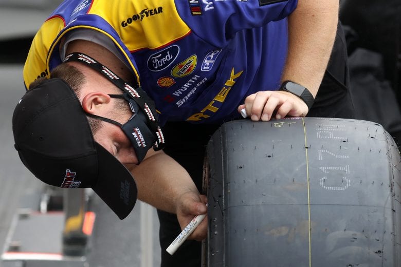 DARLINGTON, SOUTH CAROLINA - MAY 20: A crew member for Brad Keselowski (not pictured), driver of the #2 PIRTEK Ford, prepares tires prior to the NASCAR Cup Series Toyota 500 at Darlington Raceway on May 20, 2020 in Darlington, South Carolina. (Photo by Chris Graythen/Getty Images) | Getty Images