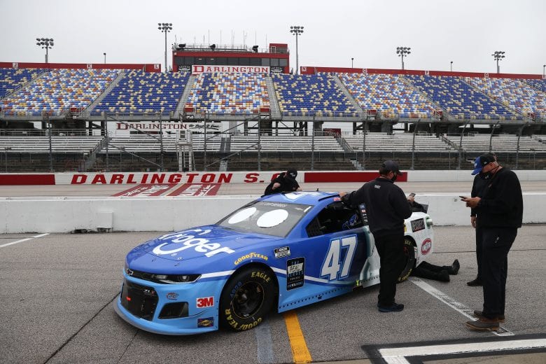 DARLINGTON, SOUTH CAROLINA - MAY 20: Crew members push the #47 Kroger Chevrolet, driven by Ricky Stenhouse Jr. through the garage area prior to the NASCAR Cup Series Toyota 500 at Darlington Raceway on May 20, 2020 in Darlington, South Carolina. (Photo by Chris Graythen/Getty Images) | Getty Images