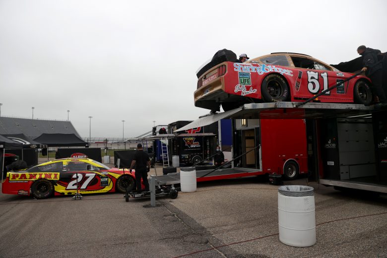 DARLINGTON, SOUTH CAROLINA - MAY 20: The crew of Joey Gase, driver of the #51 Agri Supply Ford, unload the car prior to the NASCAR Cup Series Toyota 500 at Darlington Raceway on May 20, 2020 in Darlington, South Carolina. (Photo by Chris Graythen/Getty Images) | Getty Images