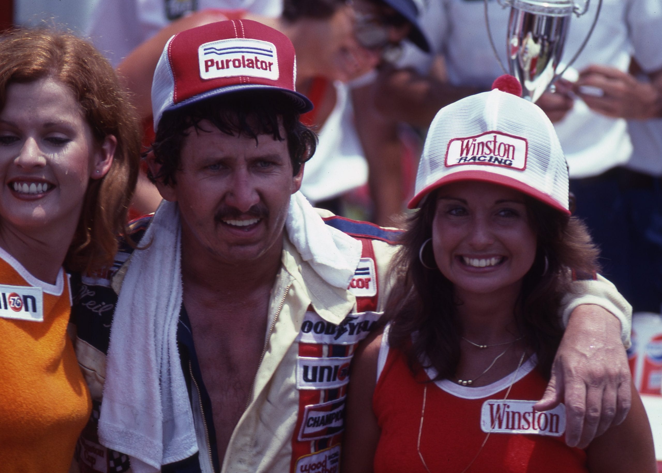DAYTONA BEACH, FL - JULY 4:  Driver Neil Bonnett celebrates in Victory Lane after winning the Firecracker 400 in his #21 Wood Brothers Purolator Mercury on July 4, 1979 at the Daytona International Speedway in Daytona Beach, Florida. (Photo byt Dozier Mobley/Getty Images)