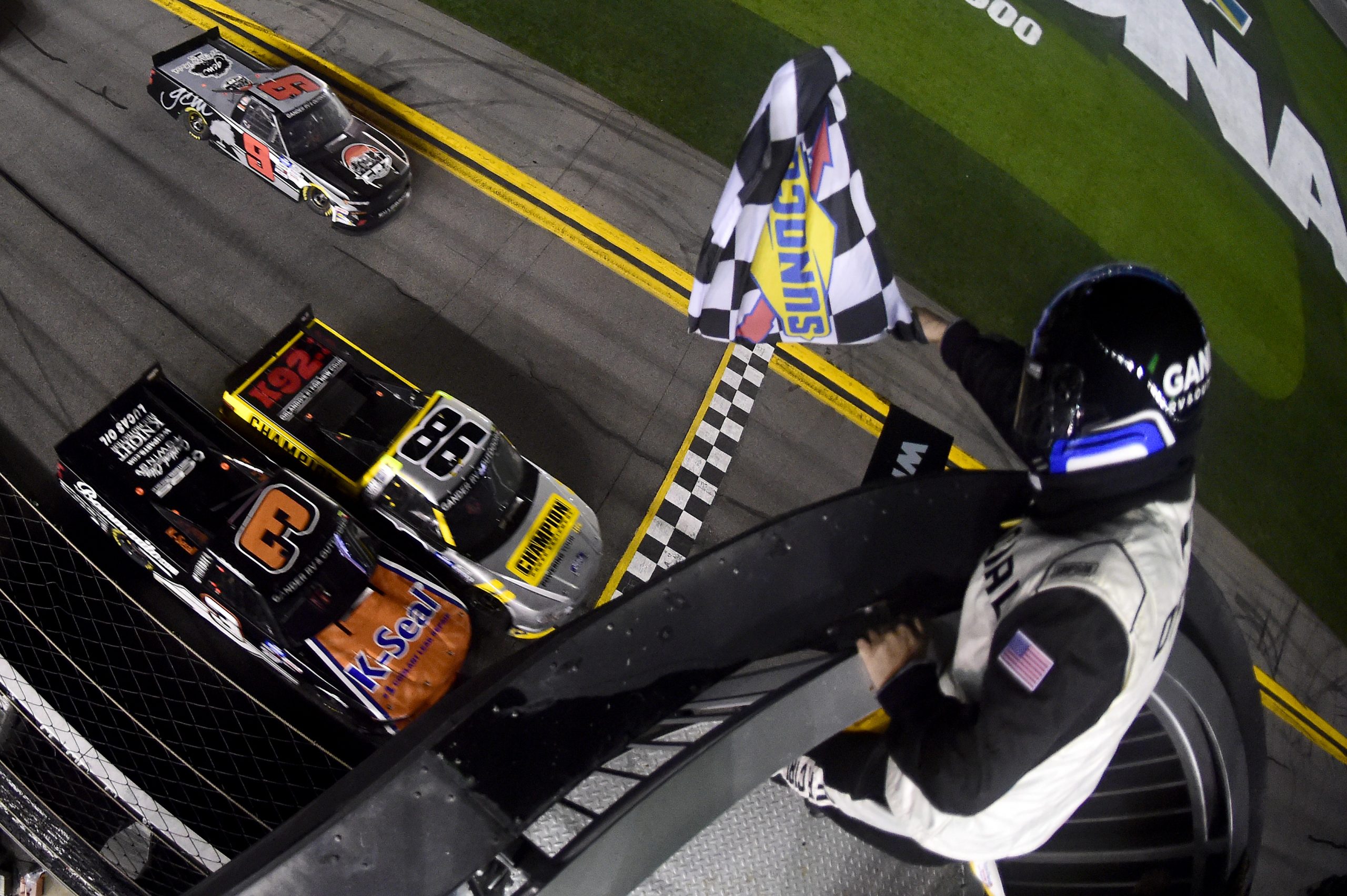 DAYTONA BEACH, FLORIDA - FEBRUARY 14: Grant Enfinger, driver of the #98 Champion/Curb Records Ford, crosses the finish line ahead of Jordan Anderson, driver of the #3 K-Seal/Bommarito.com Chevrolet, to win the NASCAR Gander RV & Outdoors Truck Series NextEra Energy 250 at Daytona International Speedway on February 14, 2020 in Daytona Beach, Florida. (Photo by Jared C. Tilton/Getty Images) | Getty Images