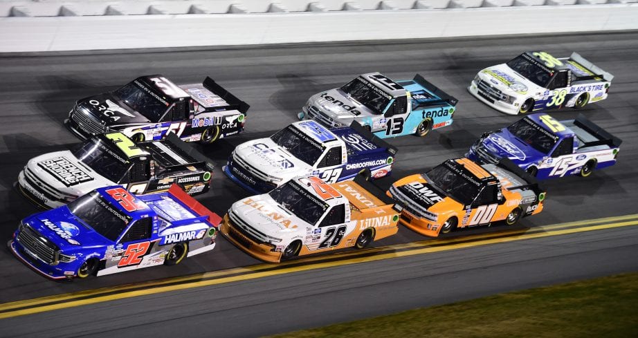 DAYTONA BEACH, FLORIDA - FEBRUARY 14: Stewart Friesen, driver of the #52 Halmar International Toyota, Sheldon Creed, driver of the #2 Chevy.com/Trench Shoring Chevrolet, and Riley Herbst, driver of the #51 Mobil 1 Toyota, lead a pack of trucks during the NASCAR Gander RV & Outdoors Truck Series NextEra Energy 250 at Daytona International Speedway on February 14, 2020 in Daytona Beach, Florida. (Photo by Jared C. Tilton/Getty Images) | Getty Images
