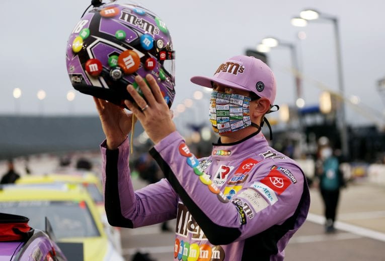 DARLINGTON, SOUTH CAROLINA - MAY 20: Kyle Busch, driver of the #18 M&M's Fudge Brownie Toyota, puts his helmet to start the NASCAR Cup Series Toyota 500 at Darlington Raceway on May 20, 2020 in Darlington, South Carolina. (Photo by Chris Graythen/Getty Images) | Getty Images