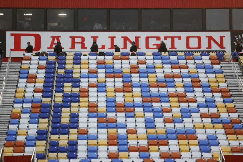 DARLINGTON, SOUTH CAROLINA - MAY 20: NASCAR team spotters look on from the grandstands during the NASCAR Cup Series Toyota 500 at Darlington Raceway on May 20, 2020 in Darlington, South Carolina. (Photo by Chris Graythen/Getty Images) | Getty Images
