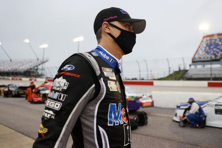 DARLINGTON, SOUTH CAROLINA - MAY 20: Kevin Harvick, driver of the #4 Mobil 1 Ford, walks  the grid prior to  the NASCAR Cup Series Toyota 500 at Darlington Raceway on May 20, 2020 in Darlington, South Carolina. (Photo by Chris Graythen/Getty Images) | Getty Images