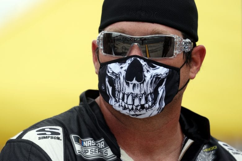 CONCORD, NORTH CAROLINA - MAY 24: A crewmember wearing a facemask looks on during qualifying for the NASCAR Cup Series Coca-Cola 600 at Charlotte Motor Speedway on May 24, 2020 in Concord, North Carolina. (Photo by Chris Graythen/Getty Images) | Getty Images