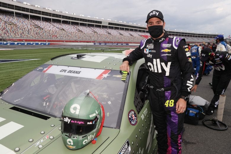 CONCORD, NORTH CAROLINA - MAY 24: Jimmie Johnson, driver of the #48 Ally Patriotic Chevrolet, stands on the grid during qualifying for the NASCAR Cup Series Coca-Cola 600 at Charlotte Motor Speedway on May 24, 2020 in Concord, North Carolina. (Photo by Chris Graythen/Getty Images) | Getty Images