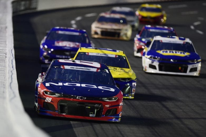 CONCORD, NORTH CAROLINA - MAY 24: Alex Bowman, driver of the #88 ChevyGood.com/NOCO Patriotic Chevrolet, leads a pack of cars during the NASCAR Cup Series Coca-Cola 600 at Charlotte Motor Speedway on May 24, 2020 in Concord, North Carolina. (Photo by Jared C. Tilton/Getty Images) | Getty Images