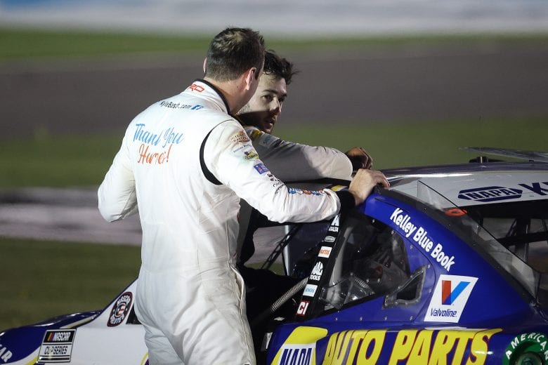 CONCORD, NORTH CAROLINA - MAY 24: Kyle Busch, driver of the #18 M&M's Red White Blue Toyota, speaks to Chase Elliott, driver of the #9 NAPA Auto Parts Chevrolet, after the NASCAR Cup Series Coca-Cola 600 at Charlotte Motor Speedway on May 24, 2020 in Concord, North Carolina. (Photo by Chris Graythen/Getty Images) | Getty Images