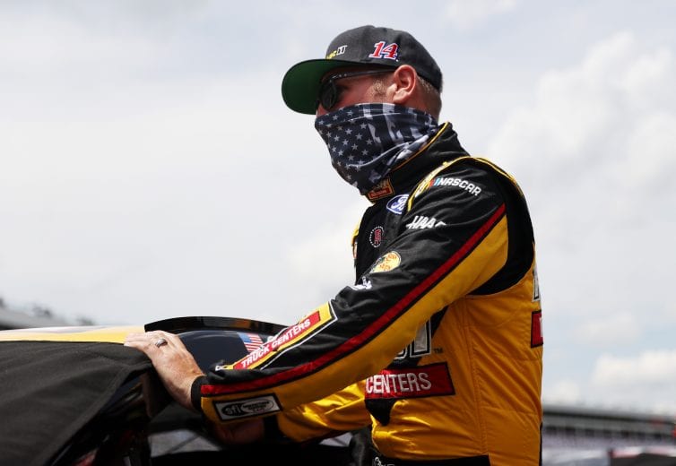 CONCORD, NORTH CAROLINA - MAY 24: Clint Bowyer, driver of the #14 Rush/Mobil Delvac 1 Ford, exits his car during qualifying for the NASCAR Cup Series Coca-Cola 600 at Charlotte Motor Speedway on May 24, 2020 in Concord, North Carolina. (Photo by Chris Graythen/Getty Images) | Getty Images