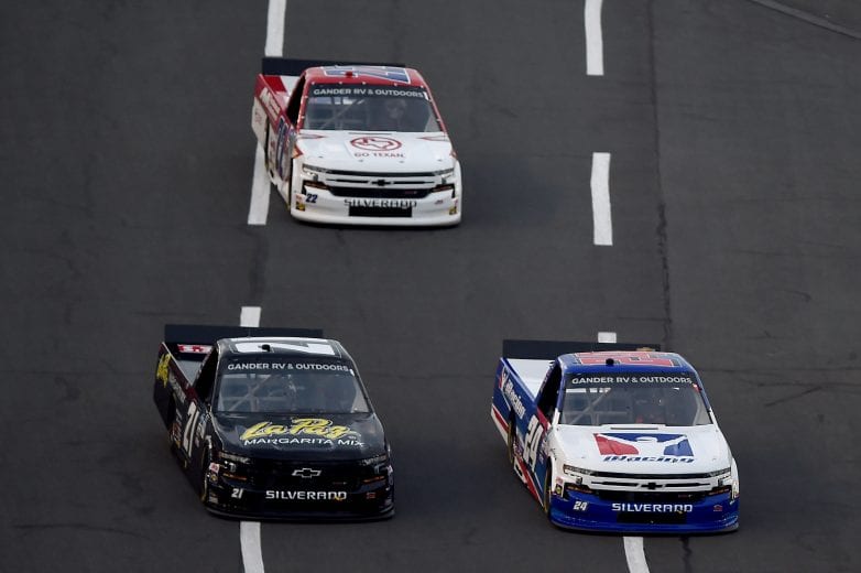 CONCORD, NORTH CAROLINA - MAY 26: Chase Elliott, driver of the #24 iRacing Chevrolet, leads Zane Smith, driver of the #21 LaPaz Margarita Mix Chevrolet, during the NASCAR Gander Outdoors Trucks Series North Carolina Education Lottery 200 at Charlotte Motor Speedway on May 26, 2020 in Concord, North Carolina. (Photo by Jared C. Tilton/Getty Images) | Getty Images