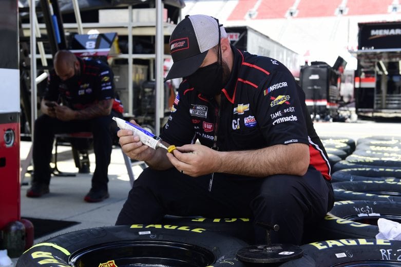 BRISTOL, TENNESSEE - MAY 31: Crew members check tires prior to the NASCAR Cup Series Food City presents the Supermarket Heroes 500 at Bristol Motor Speedway on May 31, 2020 in Bristol, Tennessee. (Photo by Jared C. Tilton/Getty Images) | Getty Images