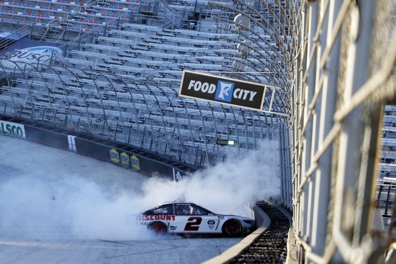 BRISTOL, TENNESSEE - MAY 31: Brad Keselowski, driver of the #2 Discount Tire Ford, celebrates with a burnout after winning the NASCAR Cup Series Food City presents the Supermarket Heroes 500 at Bristol Motor Speedway on May 31, 2020 in Bristol, Tennessee. (Photo by Kevin C. Cox/Getty Images) | Getty Images