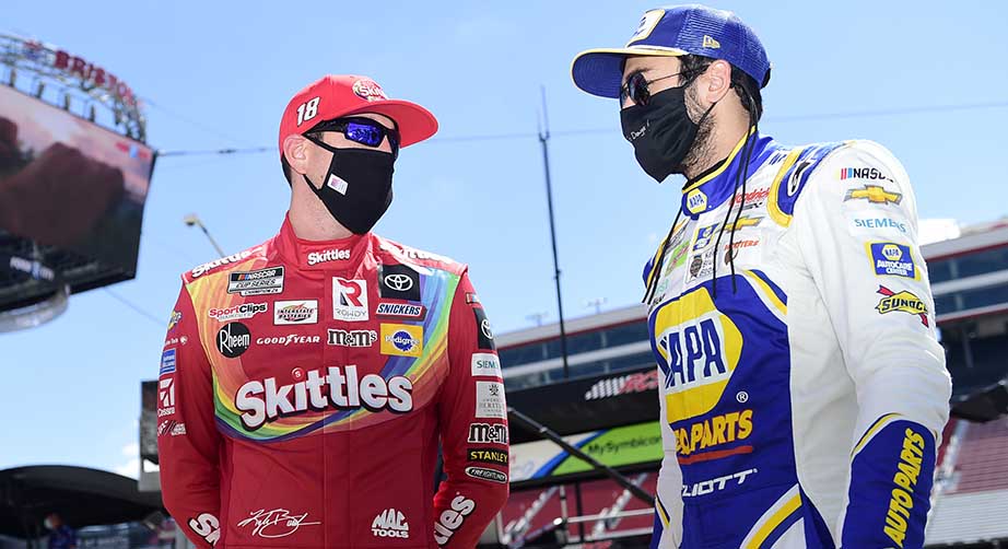 BRISTOL, TENNESSEE - MAY 31: Kyle Busch, driver of the #18 Skittles Toyota, talks with Chase Elliott, driver of the #9 NAPA Auto Parts Chevrolet, during the NASCAR Cup Series Food City presents the Supermarket Heroes 500 at Bristol Motor Speedway on May 31, 2020 in Bristol, Tennessee. (Photo by Jared C. Tilton/Getty Images) | Getty Images