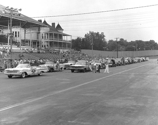 NASHVILLE, TN - AUGUST 9, 1959: The field gets ready for the start of the Nashville 300 NASCAR Cup race at Nashville Fairgrounds Speedway. Rex White is on the pole for the race, while Joe Lee Johnson (No. 77) is on the outside pole. Johnson went on to win the race. (Photo by ISC Images & Archives via Getty Images)