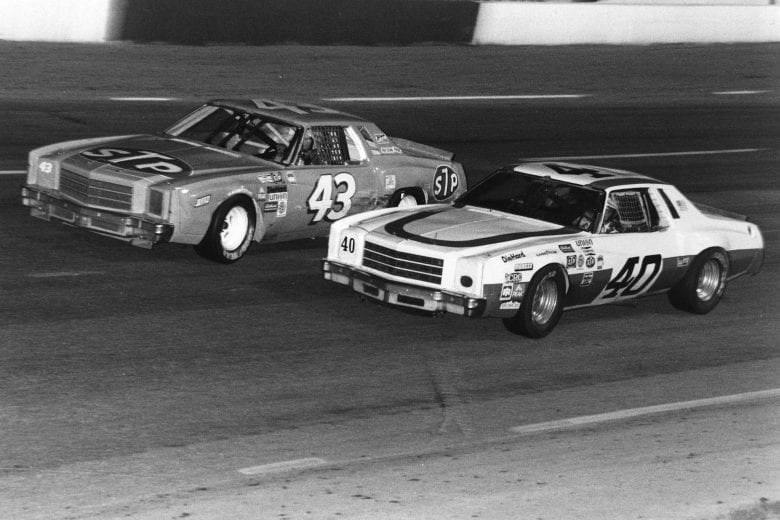 NASHVILLE, TN — July 12, 1980: Action during the Busch Nashville 420 NASCAR Cup race has Richard Petty (No. 43) battling local favorite Sterling Marlin (No. 40). Petty went on to finish fifth while Marlin gave the D. K. Ulrich car, sponsored for the race by country music legend Waylon Jennings, a good ride to finish seventh. (Photo by ISC Images & Archives via Getty Images)