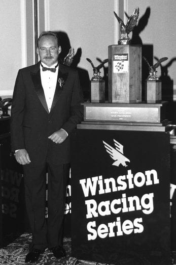 NASHVILLE, TN — 1990: Max Prestwood of Lenoir, NC, accepts his trophy as National Champion of the NASCAR Weekly Racing Series. Hickory (NC) Motor Speedway was Prestwood’s home track during the year, and he won an incredible 35 of 40 feature events held that year at the track. (Photo by ISC Images & Archives via Getty Images)