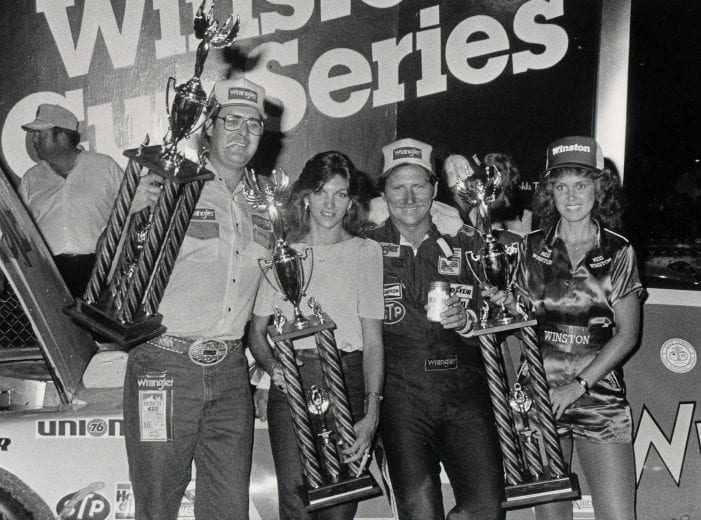 NASHVILLE, TN - JULY 16: Dave Fulton, Teresa and Dale Earnhardt celebrate with Becky Carter, Miss Winston Cup, in the winners circle. Earnhardt would take home $23,125 for the race. (Photo by Racing Photo Archives/Getty Images)