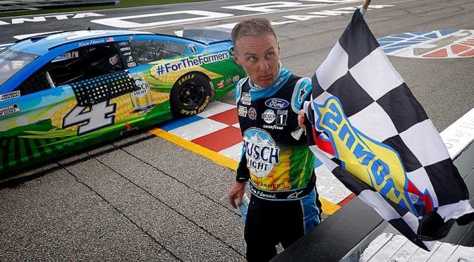 Featured image for Kevin Harvick holds on, hoists Atlanta trophy for second win of season