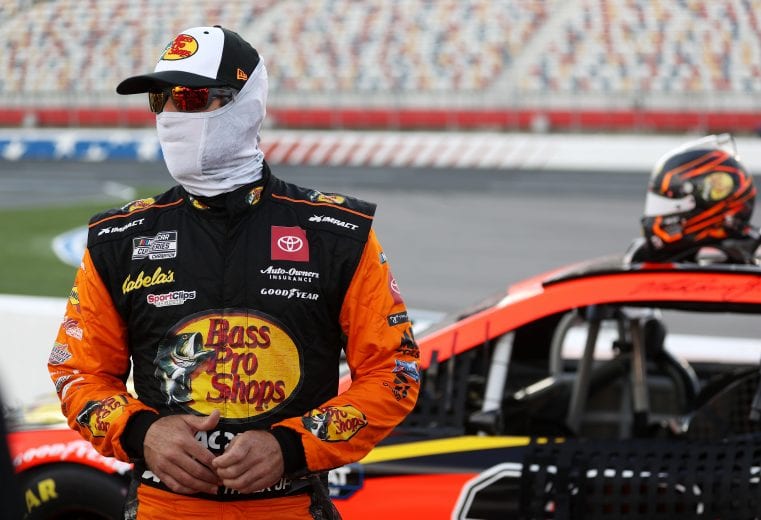 CONCORD, NORTH CAROLINA - MAY 28: Martin Truex Jr., driver of the #19 Bass Pro Shops Toyota, waits on the grid prior to the NASCAR Cup Series Alsco Uniforms 500 at Charlotte Motor Speedway on May 28, 2020 in Concord, North Carolina. (Photo by Chris Graythen/Getty Images) | Getty Images
