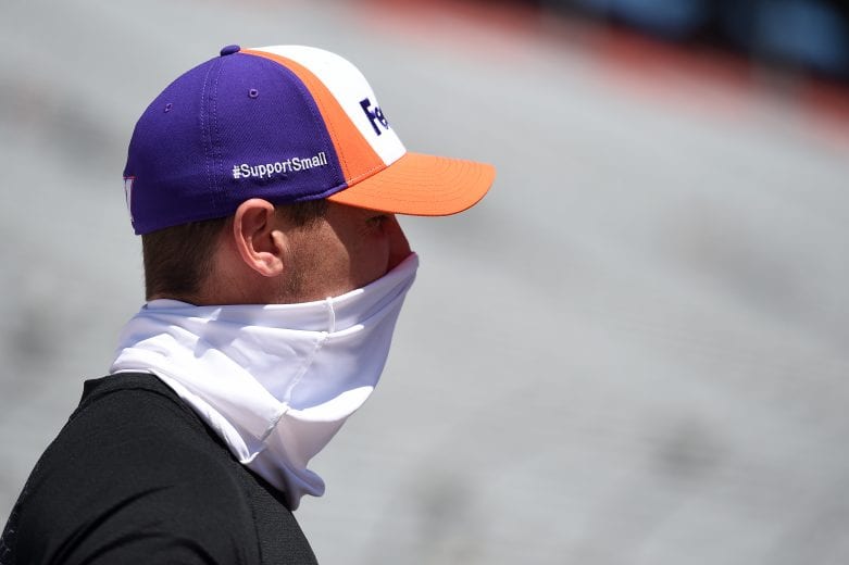 BRISTOL, TENNESSEE - MAY 31: Denny Hamlin, driver of the #11 FedEx Express Toyota, waits on the grid prior to the NASCAR Cup Series Food City presents the Supermarket Heroes 500 at Bristol Motor Speedway on May 31, 2020 in Bristol, Tennessee. (Photo by Jared C. Tilton/Getty Images) | Getty Images